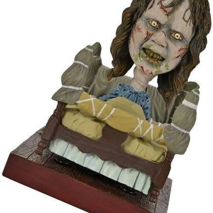 NECA The Exorcist Regan in Bed Head Knocker Bobblehead