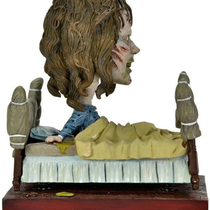 NECA The Exorcist Regan in Bed Head Knocker Bobblehead