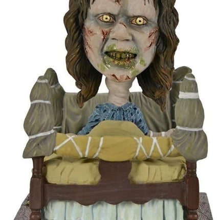 NECA The Exorcist Regan in Bed Head Knocker Bobblehead